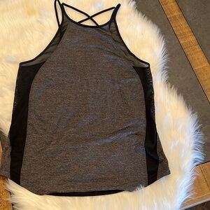 Lululemon run off route tank. Size 4 or 6 not sure.Camo gray and black color.